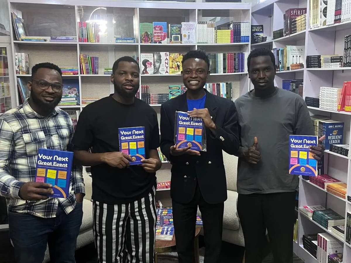 Four people holding Your Next Great Event in a bookshop